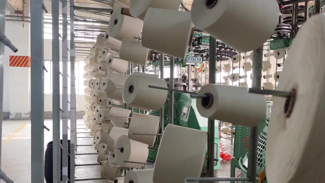 Woven fabric being produced at a Janki Nath & Co. weaving unit in India